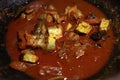 Spicy kerala style fish curry in clay pot. Royalty Free Stock Photo