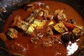 Spicy kerala style fish curry in clay pot. Royalty Free Stock Photo