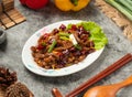 Spicy Kung Pao Beef with red chili served in dish isolated table top view of chinese food