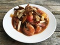 Spicy lotus stem salad with Shrimp on Black dish