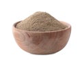 Spicy milled black pepper in wooden bowl isolated