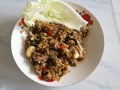 Spicy minced catfish: Lap Praduk .thai dish where catfish is minced and cooked,  fish sauce, dry minced red chili, Royalty Free Stock Photo