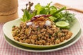 Spicy minced duck salad with herbs and vegetables or laab ped