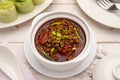 Spicy minced pork dip with red cherry tomatoes Royalty Free Stock Photo