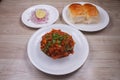 Spicy Misal Pav or Usal Pav is a traditional snack or Chaat food from Maharashtra, India. Served with chopped onion, lemon wedges Royalty Free Stock Photo