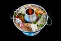 Spicy mixed seafood soup in boiled hot pot Royalty Free Stock Photo