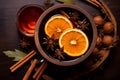 Spicy mulled wine with aromatic spices and orange