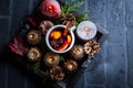 Spicy mulled wine with orange, cinnamon and anise in mug Royalty Free Stock Photo
