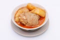 Spicy Muslim chicken curry, chicken Thai Massaman curry and potato in a bowl isolated on white background