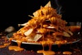 spicy nacho sauce dripping on tortilla chips