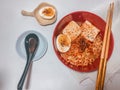 Spicy Noodle soup with egg and tofu