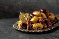 Spicy olives in a silver dish