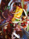 spicy papaya and corn salad with black crab Thailand  called farmer crab and fresh shrimp Royalty Free Stock Photo