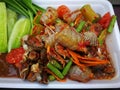 spicy papaya and corn salad with black crab Thailand  called farmer crab and fresh shrimp Royalty Free Stock Photo