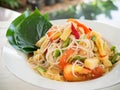 Spicy papaya salad with rice noodle or somtum famous traditiona