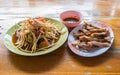 Spicy papaya salad with salted crab and fermented fish and grill Royalty Free Stock Photo