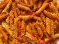 Spicy Pasta Arrabiata Topped With Parmesan Cheese