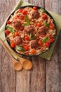 Spicy pasta with meatballs, olives, basil and tomato sauce close Royalty Free Stock Photo