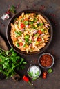 Spicy pasta penne bolognese with vegetables, beans, chili and cheese in tomato sauce Royalty Free Stock Photo