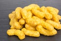 Spicy peanut puffs