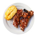 Spicy pig trotters grill with baked potato Royalty Free Stock Photo