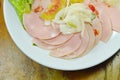 Spicy pork bologna and white mushroom salad on plate Royalty Free Stock Photo