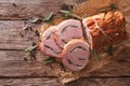 Spicy pork roast with sage close up on the table. horizontal top Royalty Free Stock Photo