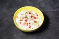 Spicy Raita Vegetable, cucumber, mint and tomato served in dish isolated on grey background top view of indian and bangladesh food Royalty Free Stock Photo