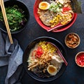 Spicy ramen bowls with noodles, pork and chicken