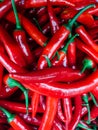 Lots of spicy red chilli peppers for cooking as a background Royalty Free Stock Photo