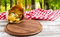 Spicy red chilli potato chips and empty board on a wooden table Royalty Free Stock Photo