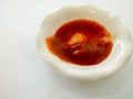 Spicy red chilli sauce in a cup Royalty Free Stock Photo