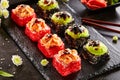 Spicy roll with masago caviar and wasabi