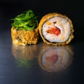 Spicy roll of rice and nori seaweed with breaded seaweed