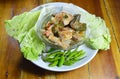 Spicy salmon in green curry eat couple with fresh vegetable on dish