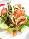Spicy salmon salad with mixed vegetable,Thai food.