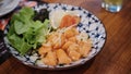 Spicy salmon sashimi salad