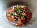 spicy sardines mixed with celery leaves