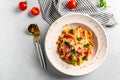 Spicy savory italian penne pasta garnished tomato sauce served with grated Parmigiano-Reggiano, or parmesan, cheese. banner, menu Royalty Free Stock Photo