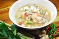 Spicy seafood hot soup and mixed herb Royalty Free Stock Photo