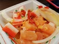 Spicy seafood salad with Salmon and Kani.