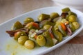 Spicy skewer appetizers with green olives, anchovies and jalapeÃÂ±os