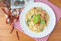 Spicy spaghetti with sausage, basil Royalty Free Stock Photo