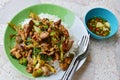 Spicy stir-fried chicken innards with basil leaves on rice Royalty Free Stock Photo