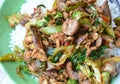 Spicy stir-fried chicken innards with basil leaves on rice Royalty Free Stock Photo