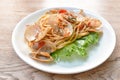 Spicy stir fried spaghetti clams with pepper and basil leaf on plate Royalty Free Stock Photo
