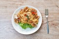 Spicy stir fried spaghetti clams with pepper and basil leaf on plate Royalty Free Stock Photo