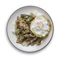 Spicy stir-fry beef with the holy basil topping with fried egg Royalty Free Stock Photo