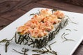 Spicy sushi rolls in nori on white background Royalty Free Stock Photo