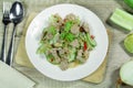 Spicy tenderloin pork with cucumber salad.